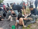 Poltekkes Palu – TNI AL Gelar Simulasi Penyelamatan Kecelakaan di Laut Parimo